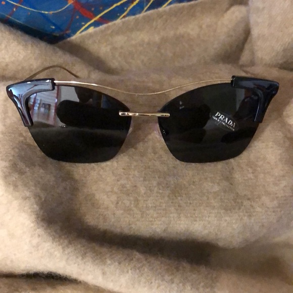 Prada Accessories - Prada
Monochromatic Semi-Rimless Sunglasses